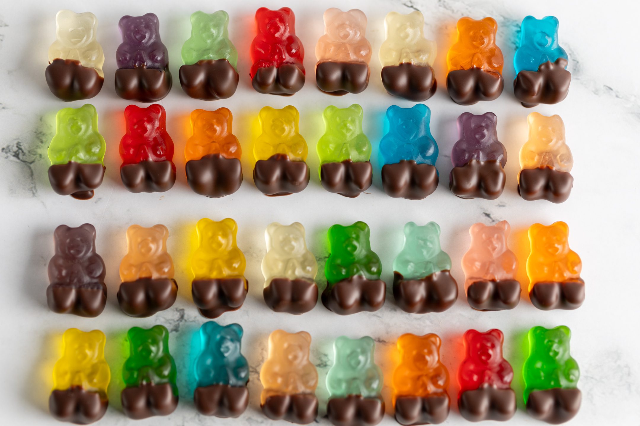 Bears in Pants gourmet chocolate-dipped gummy bears by Sucré in assorted fruit flavours