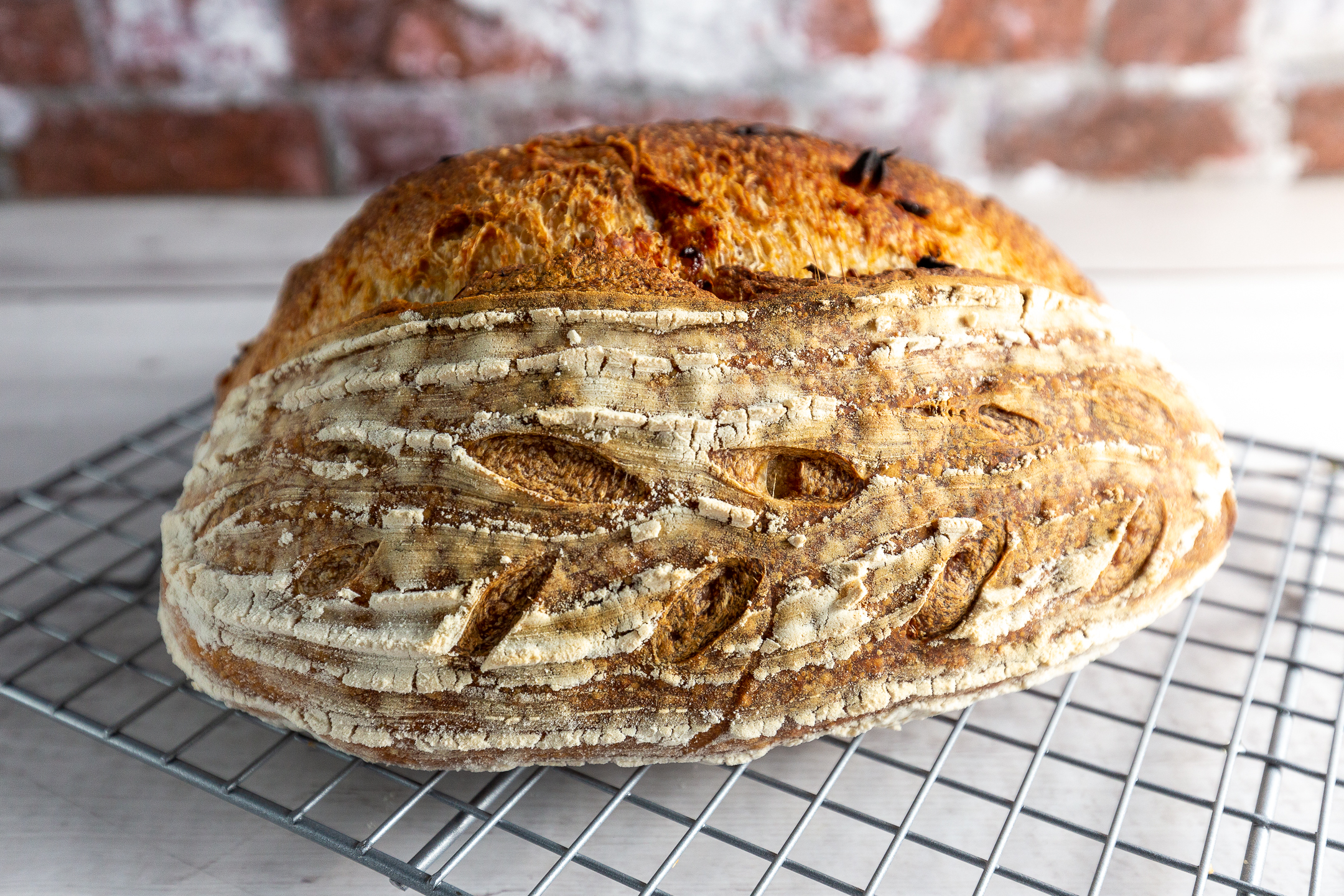 Artisan Sourdough Loaf by Sucré — made with organic spelt starter from 2018 and high-protein flour
