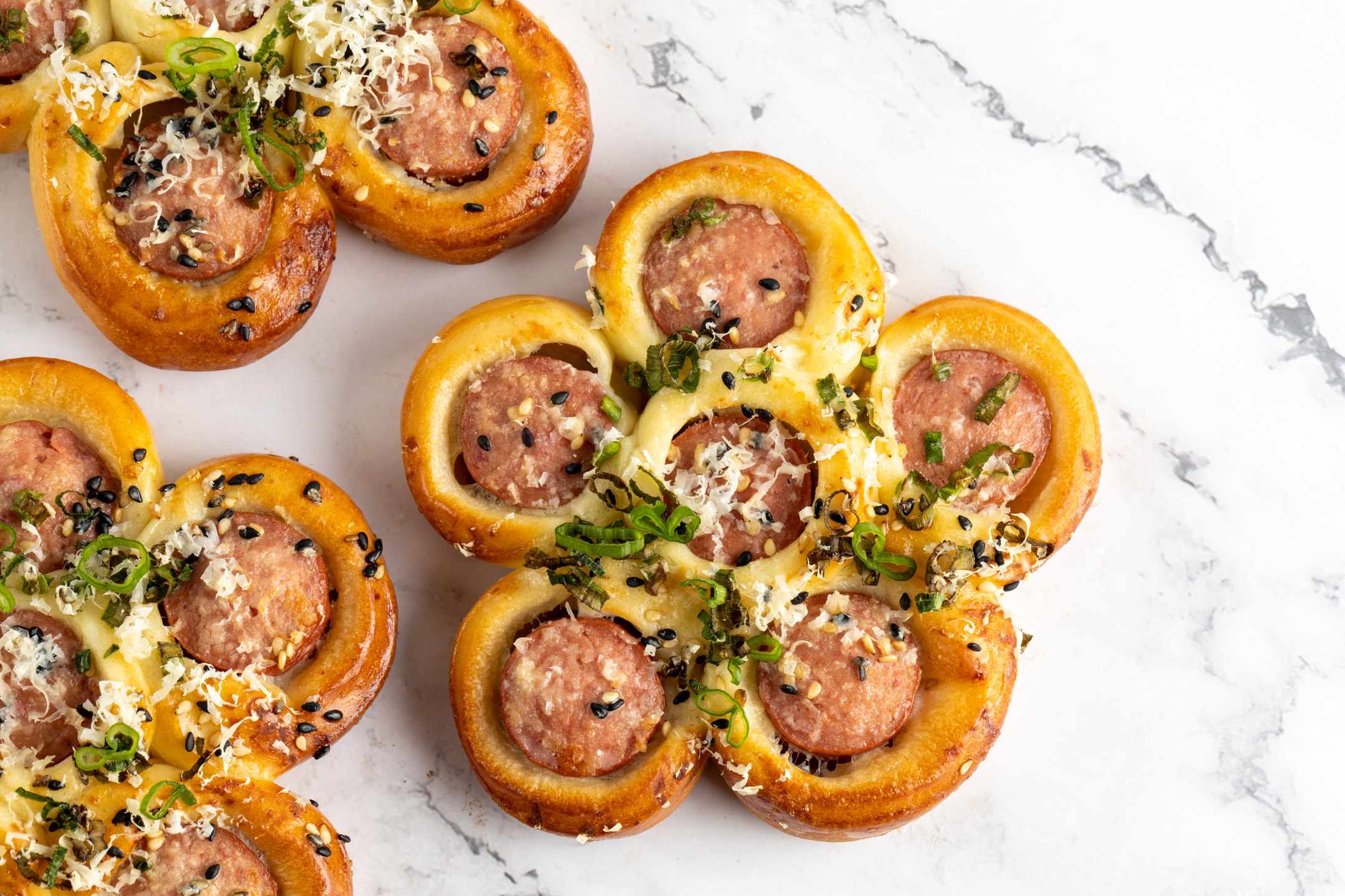 Hot Dog Flower Bun by Sucré — handmade flower-shaped Japanese milk bread with Vienna sausage, Parmigiano Reggiano and sesame seeds