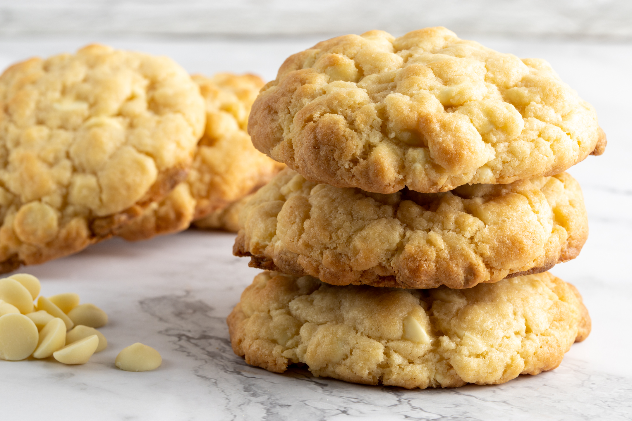Quarter Pound Belgian White Couverture Chocolate Cookie by Sucré — buttery golden cookie loaded with white chocolate