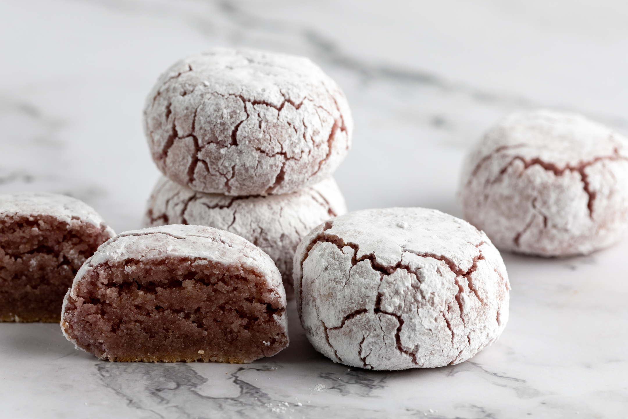 Amaretti Raspberry cookies — traditional Italian almond cookies with real raspberries dusted with icing sugar