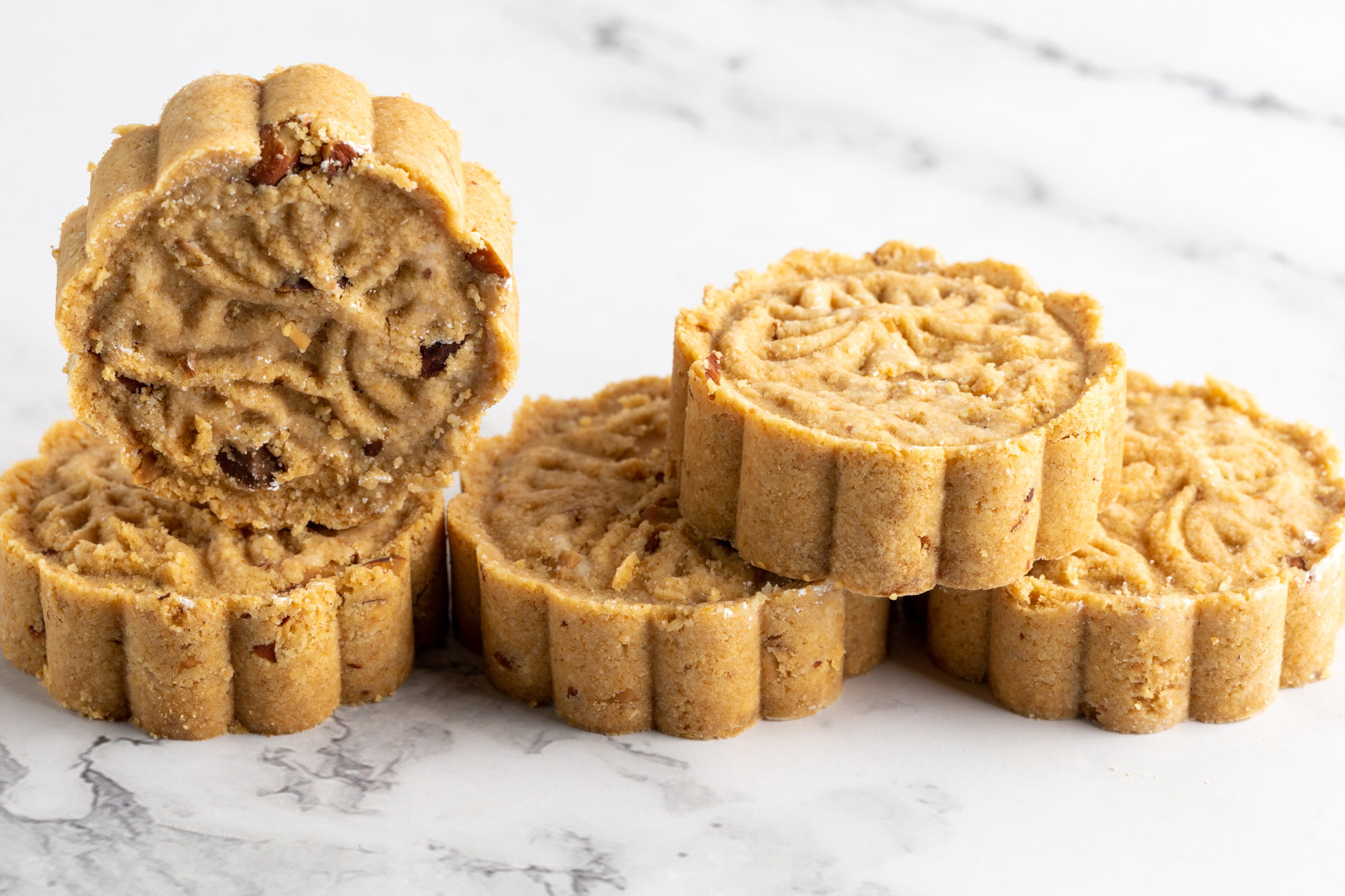 Macau Almond Cookies by Sucré — roasted almond and toasted mung bean cookies pressed in decorative scallop shape