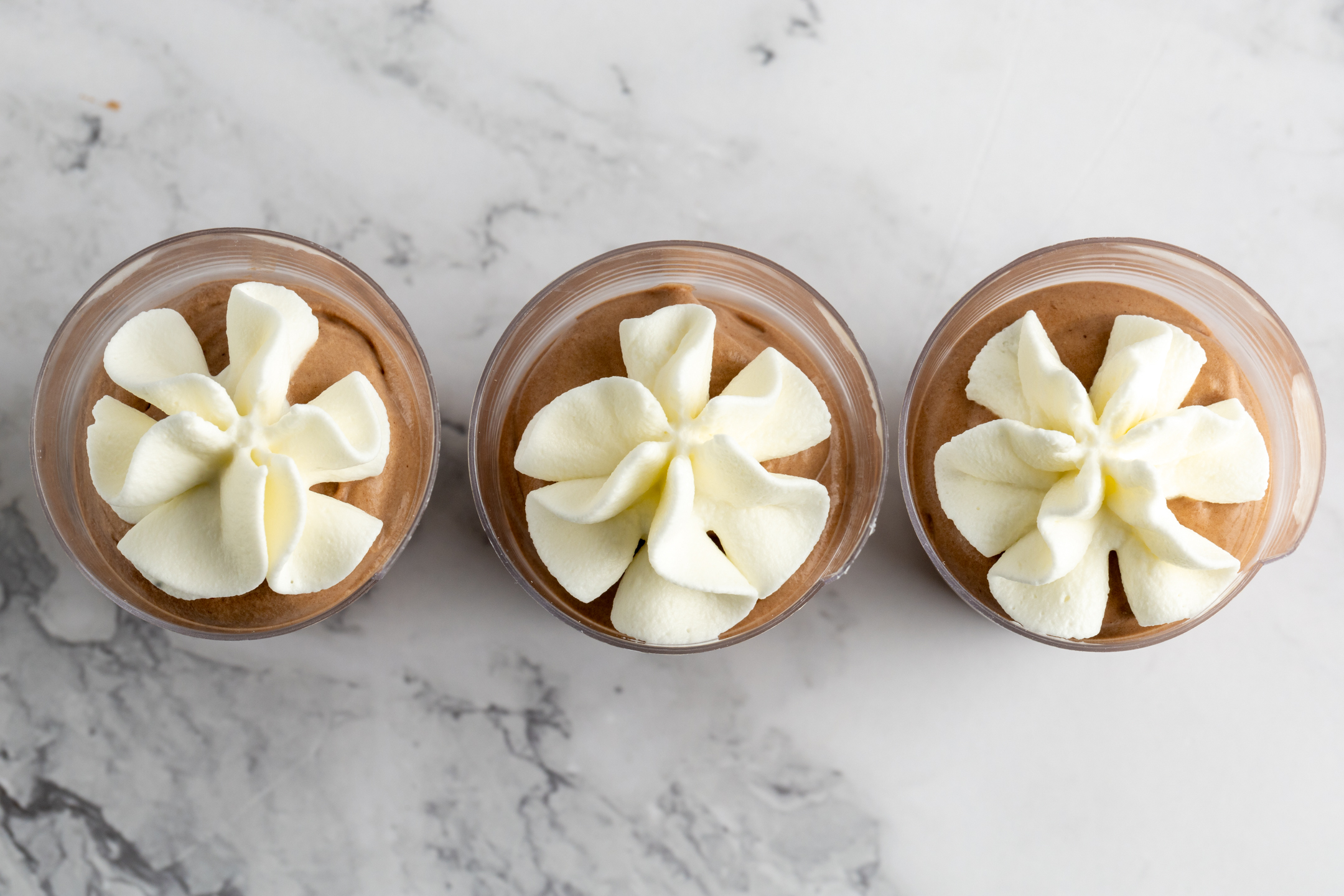 Tray of Belgian Chocolate Mousse Shooters with mini spoons for events and gatherings