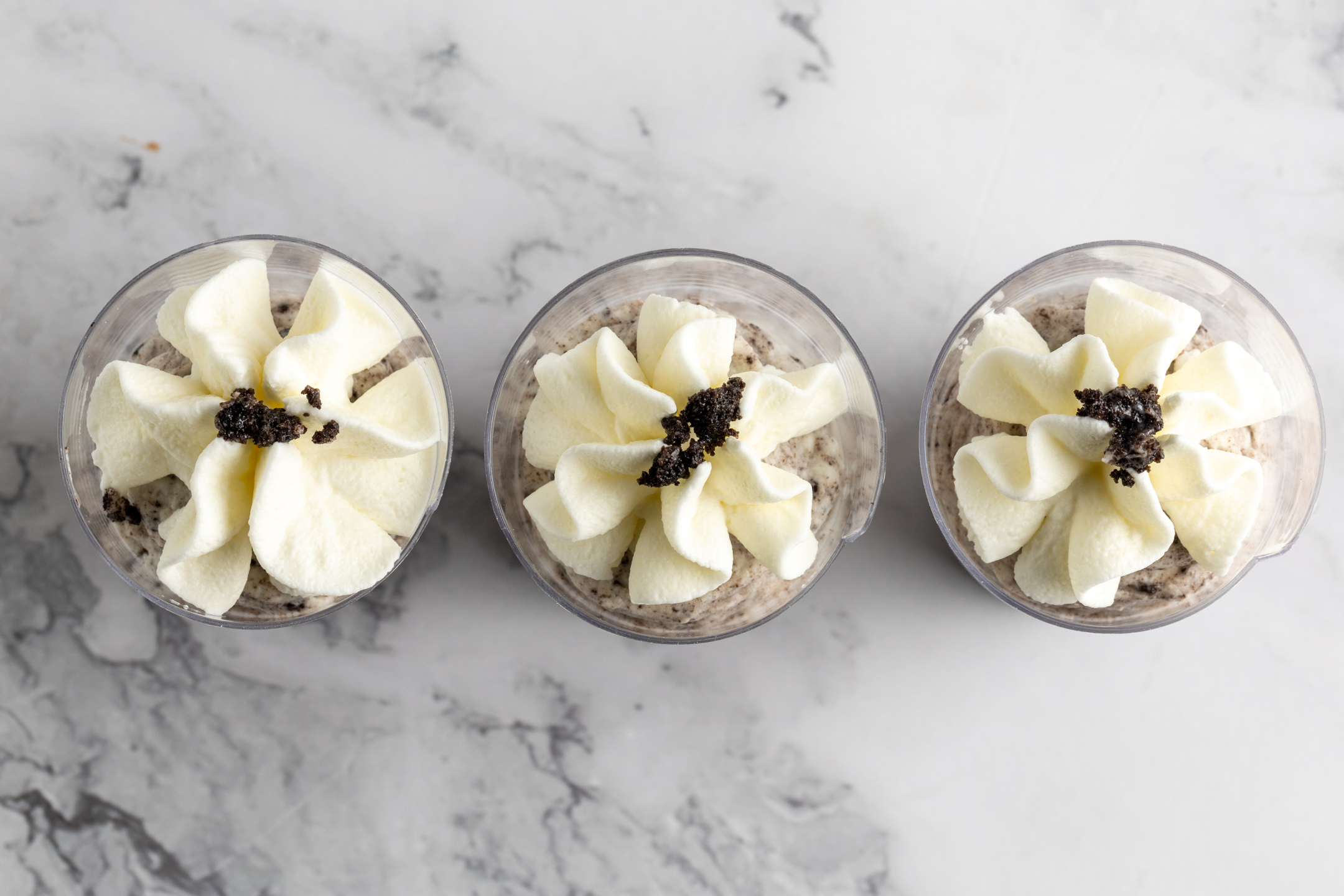 Tray of Oreo Cheesecake Shooters styled for event dessert table