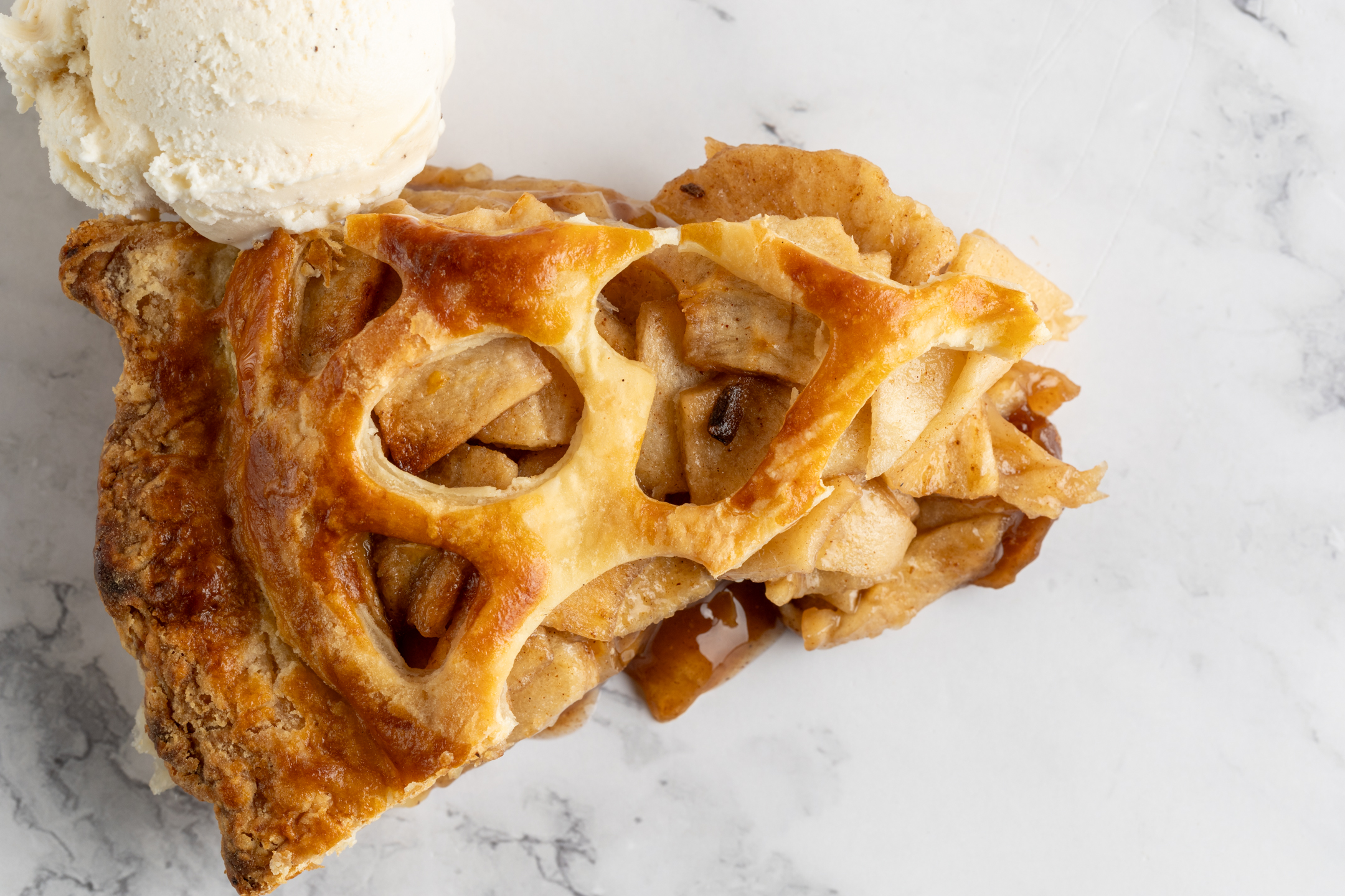 Honeycrisp Apple Pie slice showing Ontario Honeycrisp apple filling with warming spices