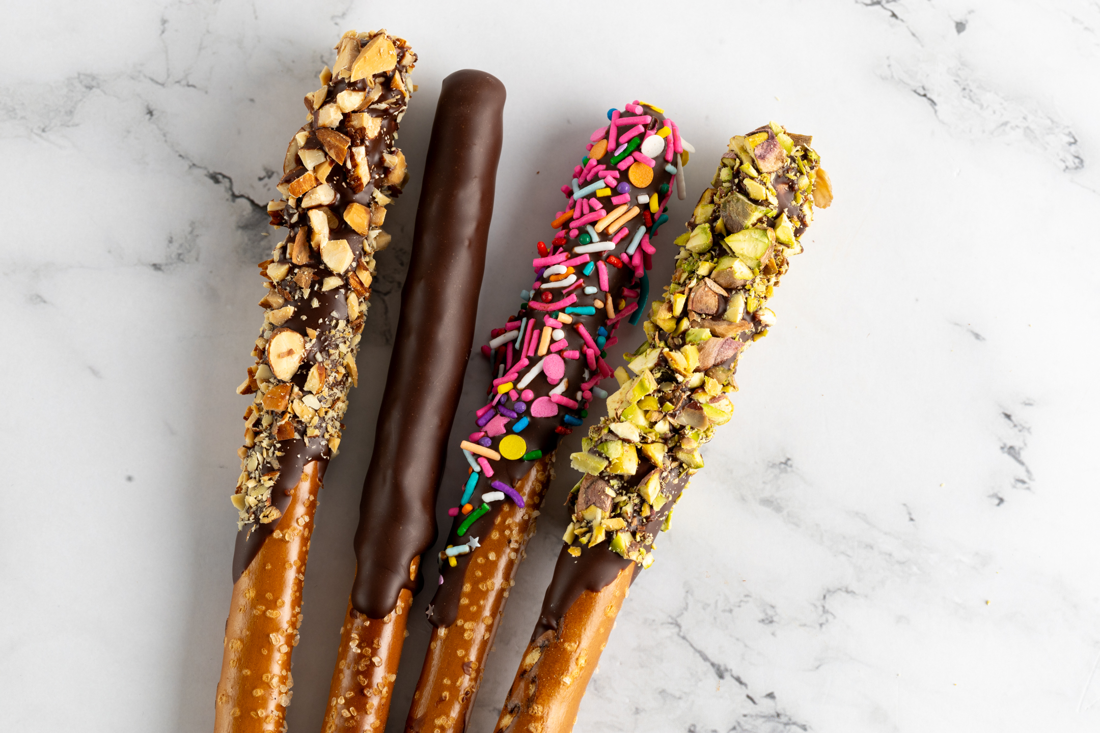 Belgian Couverture Chocolate-Covered Pretzel Rods individually wrapped by Sucré