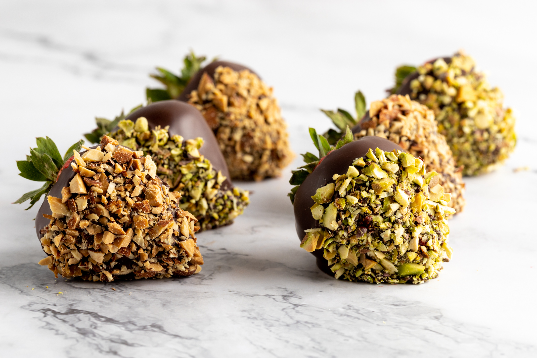 Strawberry ChocoGems Fruit and Nut — Belgian chocolate strawberries rolled in in-house roasted almonds and pistachios