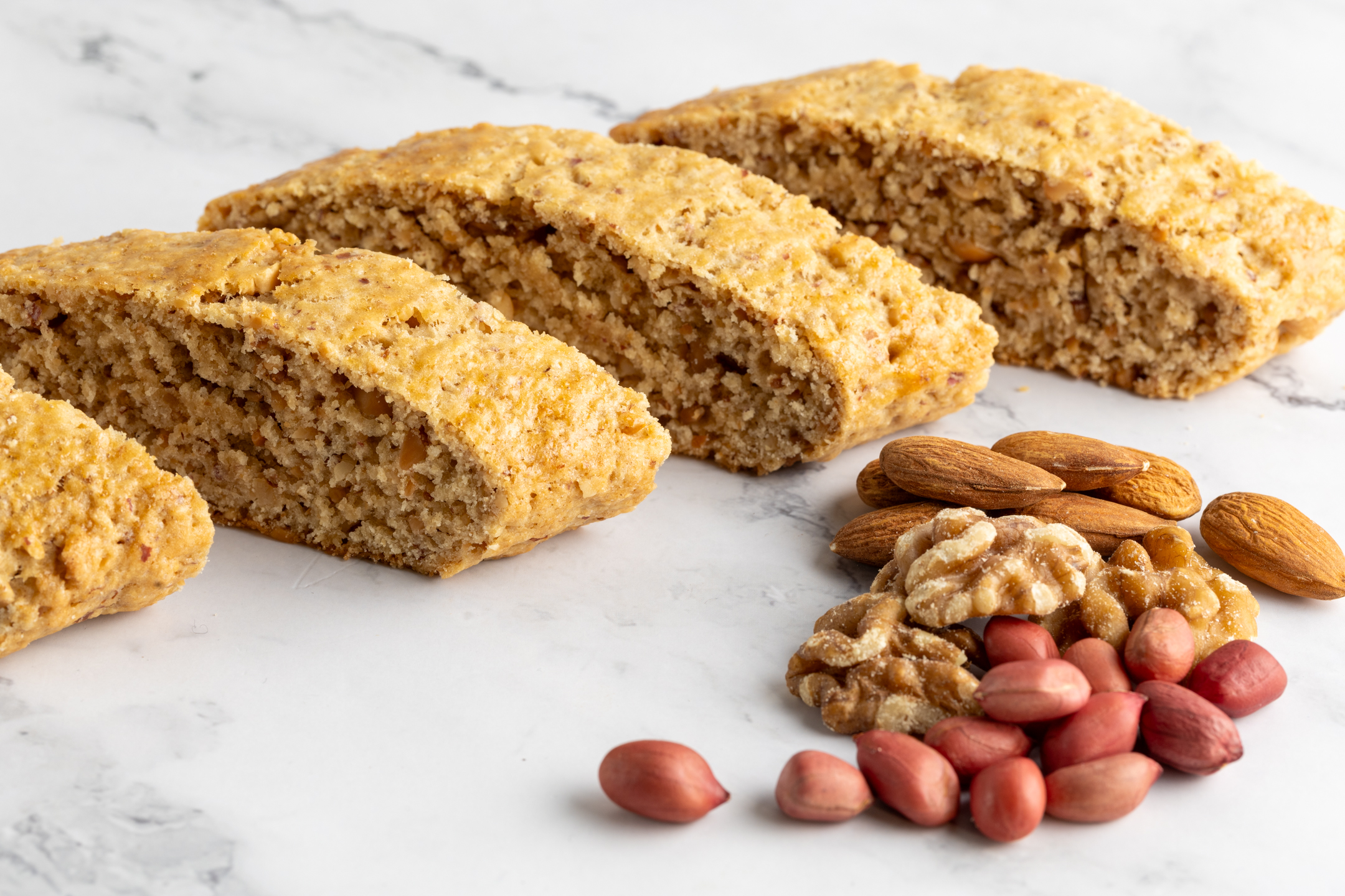Jugu and Friends Biscotti sliced showing nut-studded interior