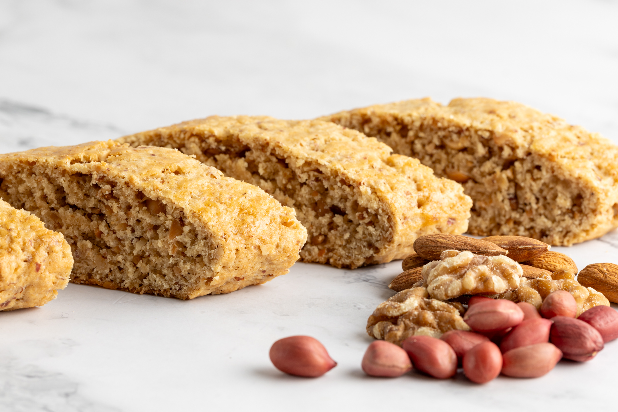 Jugu and Friends Nutty Biscotti log — peanut, almond and walnut biscotti by Sucré