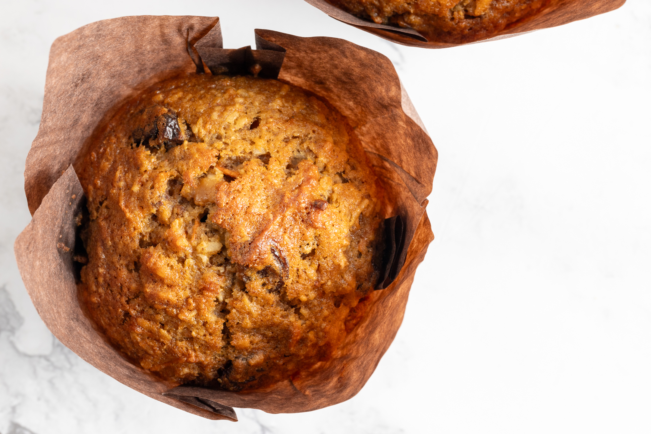Morning Glory Muffin by Sucré — carrot, apple, coconut and walnut muffin with Cara Cara orange
